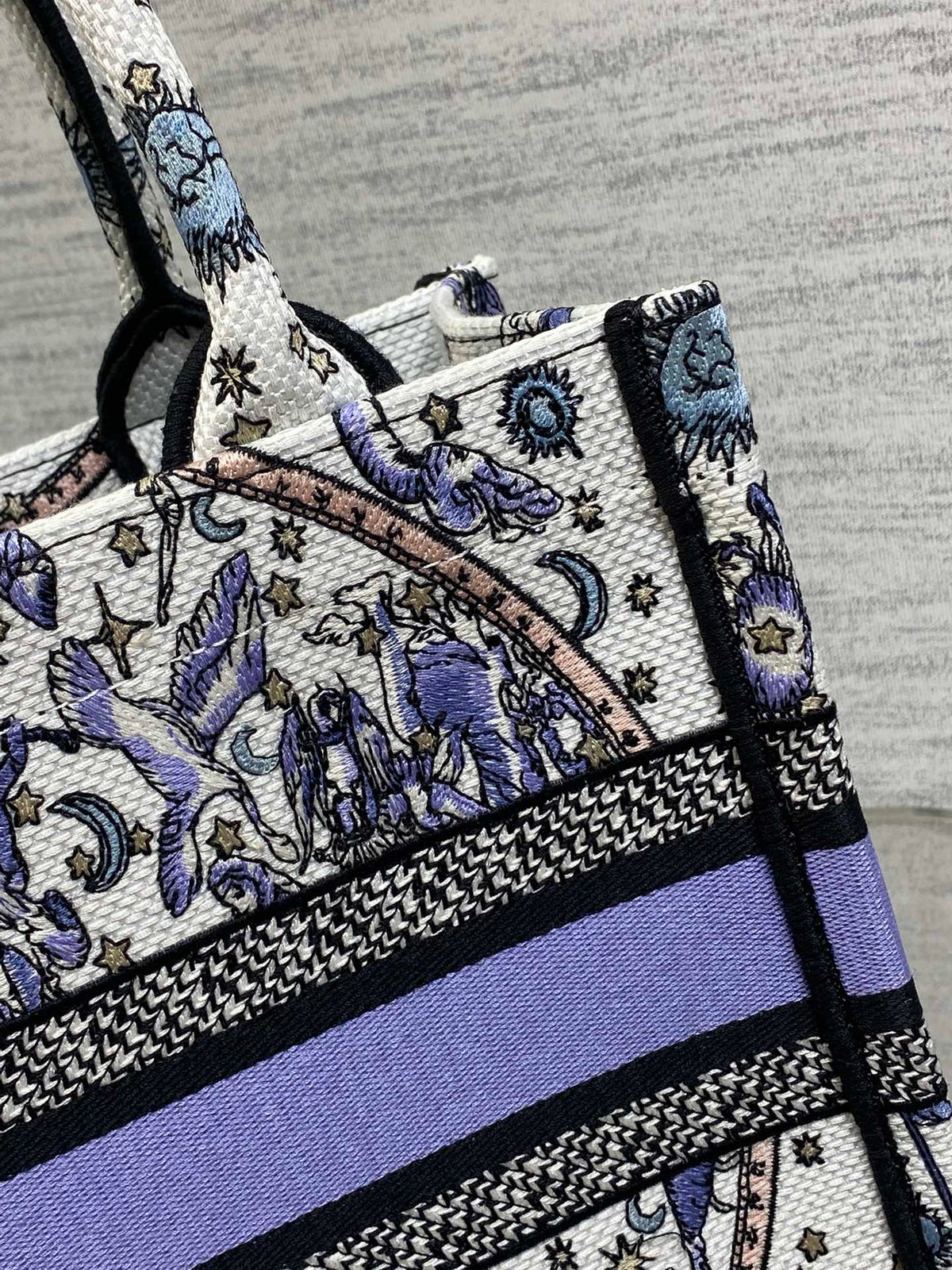 DIOR 25S SMALL BOOK TOTE 26 IN WHITE AND PURPLE DIOR NIGHT OF DREAMS EMBROIDERY