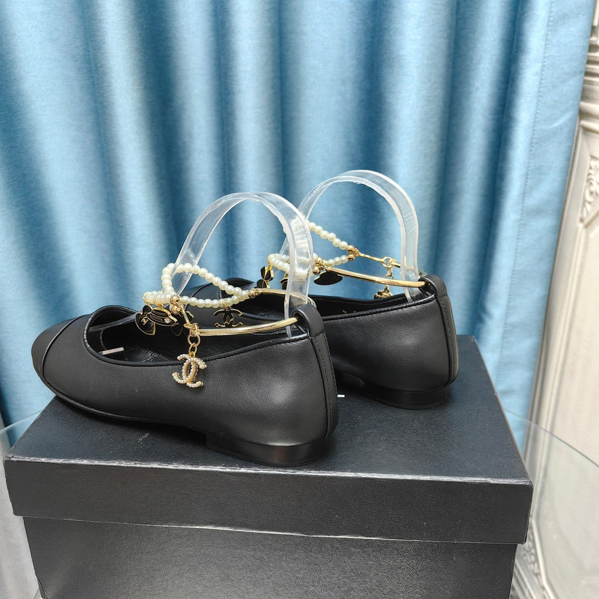 CHANEL MARY JANE WITH PEARL STRAP IN BLACK LAMBSKIN